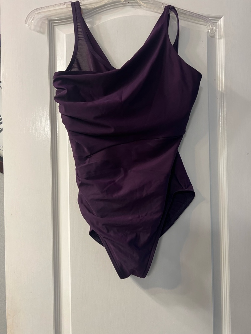 NWT Miraclesuit deep plum 1 piece suit size 12. Retails at $172